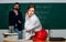 Learning to seduce. Sexy woman back to class. Sensual woman teacher with sexy look. Pretty woman seduce bearded man in