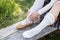 Leather bast shoes of a Latvian woman in traditional clothing. Preparing Ligo festival. Riga. Latvia