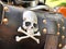 Leather biker bag with skull and bones on a motorcycle close-up. Concept travel on a motorcycle