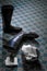 Leather Boots On Patterned Floor With Cloth And Polish