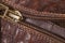 Leather brown opened zipper and brown natural leather material