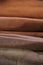 Leather brown rolls.Leatherworking.Leather goods material. Genuine leather set of brown colors.Hobby and craft material