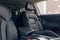 Leather car interior. Modern car illuminated dashboard. Luxurious car instrument cluster