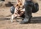 Leather-clad man and cute dog companion