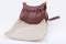 Leather hunting bag with brown ornament with patronage on white background