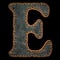 Leather letter E uppercase. 3D render font with skin texture isolated on black background.
