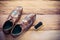 Leather shoes, brushes, placed on a wooden floor