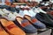 Leather shoes retail shop in rows varied colors