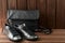 Leather upper metallic womens shoes and black leather bag on bro