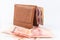 Leather wallet with Banknotes of Thailand on white