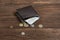 Leather wallet with dollars on a wooden background