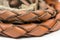 Leather whip isolated over white background closeup macro