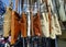 leather women's bags put up for sale at the street market stall tent