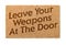 Leave Your Weapons At The Door Welcome Mat On White