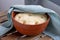 Leavened dough in ceramic bowl