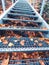 Leaves on steps of steel grate staircase to the rock view, former rock castle Falkenstejn