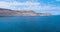 Leaving island Pag by ferry, rocky landscape