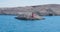 Leaving island Pag by ferry, rocky landscape