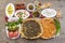 Lebanese food of Manakish, Lbaneh, cheeses, Vegetables and olives