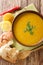 Lebanese Lentil Soup Shorbat Adas closeup in the bowl. Vertical top view