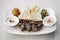 Lebanese meshwi mixed grilled meat set on plate