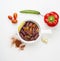 Lebanese starters of Sausage meat marinated, sausages fried in a metal pan isolated on white