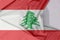 Lebanon fabric flag crepe and crease with white space.