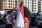 Lebanon Flag in hand of Lebanese Protester in Beirut after the Massive explosion in City Port