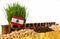 Lebanon flag waving with stack of money coins and piles of wheat