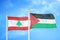 Lebanon and Palestine two flags on flagpoles and blue cloudy sky