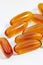 Lecithin supplement capsules close up. Medical pills macro