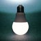 Led bulb included on a dark background. everyday household item in electricity