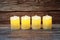 LED Candle Light electronic on wooden background