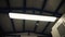 Led lamp on ceiling of electrical substation low angle shot