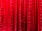 LED lights on red certain fabric backdrop as the abstract background