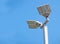 LED street lamps post on blue sky b