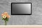 LED television screen mockup, blank hdtv on concrete wall in the room