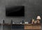 Led tv wooden media furniture with concrete wall in livingroom