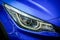 LED xenon headlight of blue modern car