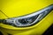 LED xenon headlight of yellow modern car