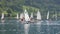 Ledro, Italy. Sailing school on small boats. School on Lake Ledro. Alpine lake. Summer time