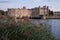 Leeds Castle in Kent UK with reeds in the foreground, photographed in late afternoon on a clear crisp autumn afternoon.