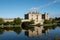 Leeds Castle near Maidstone, Kent UK. Castle is reflected in the lake. Photographed on a crisp, clear day in autumn.