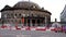 The Leeds City Centre showing the Leeds building known as the Leeds Corn Exchange with major road works happening outside the