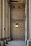 Leeds town hall entrace with stone pillars and Victorian lamp