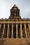 Leeds town hall front view with columns steps and clock tower