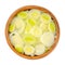 Leek slices, chopped leaf sheaths in a in wooden bowl