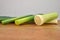 Leek vegetables , covered with drops of water. Allium porrum. White background.