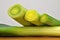 Leek vegetables , covered with drops of water. Allium porrum. White background.