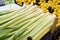 leeks stacked in the greengrocer aisle, leeks ready for sale in the greengrocer